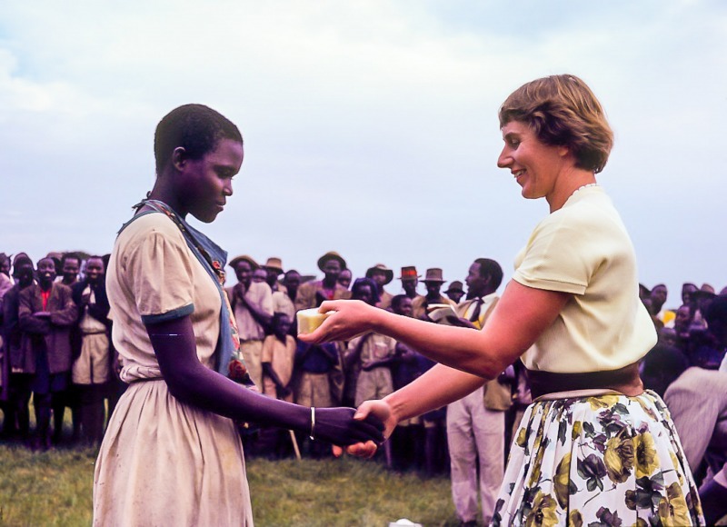 Betty presenting pizes at sports day, a bar of soap.