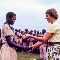 Betty presenting pizes at sports day, a bar of soap.