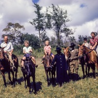 Mike, Stephen, Peter, ?, ?, ? and Betty on horse back
