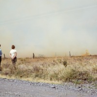 Watching a grass fire