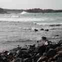 Portinfer Bay and surfers, Guernsey, 2010