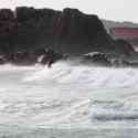 Portinfer Bay and surfers, Guernsey, 2010