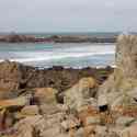 Portinfer Bay and surfers, Guernsey, 2010