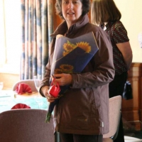 Jane with flowers for her Auntie Winnie