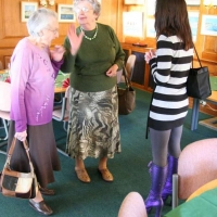 Winnie too sizes up Selina's boots & they compare shoe sizes. A couple of glasses of wine & mum will try them on.....