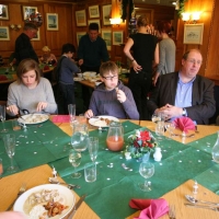 Simon sits next to his son Hugh, and next to his some-complicated-cousin-relationship-to Jane