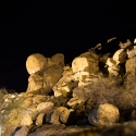 Ai Aiba lodge, rocks at night over the lane to the bedrooms