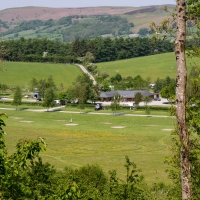 Morrison parked in an empty field