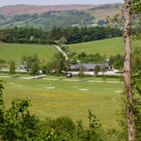 Morrison parked in an empty field